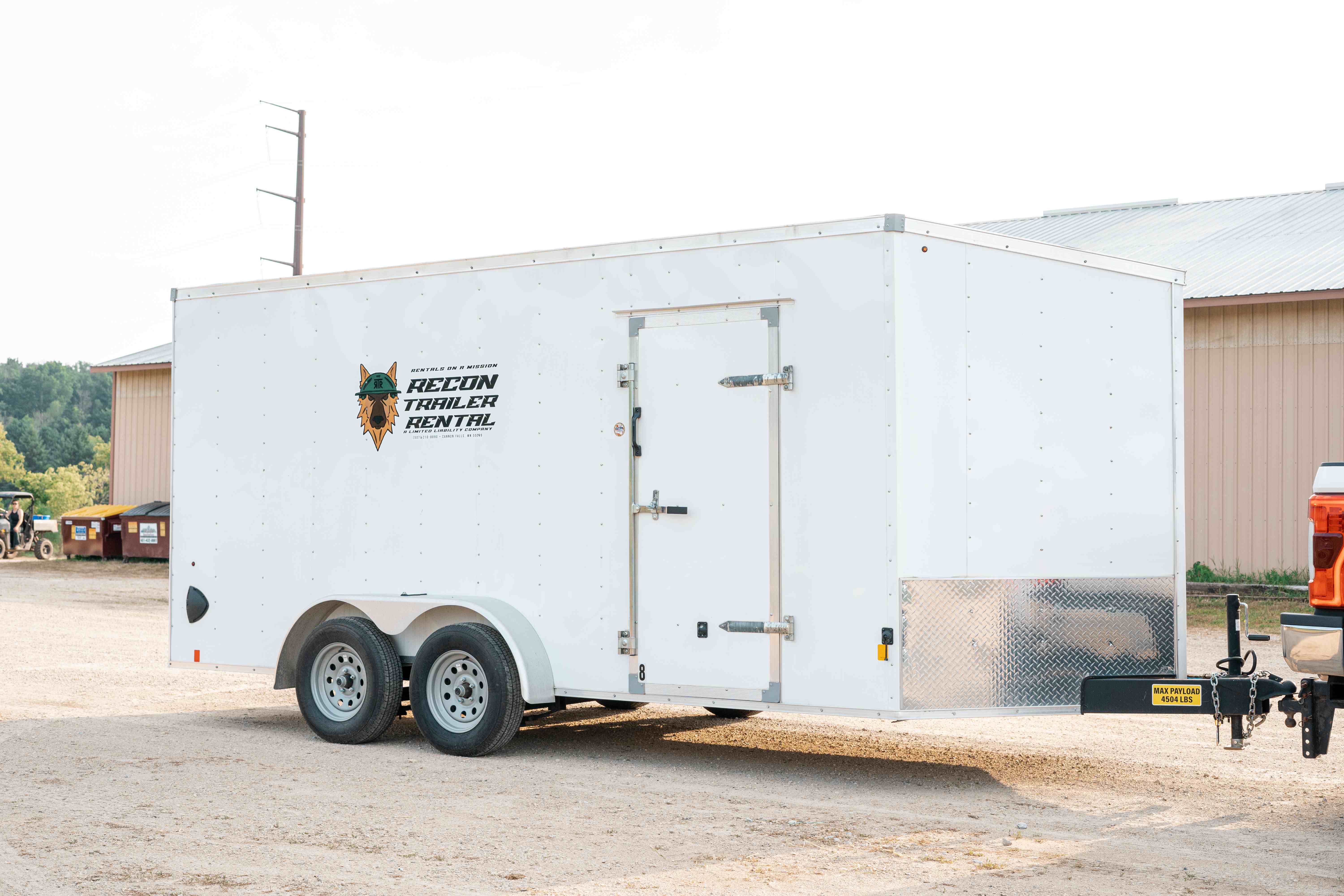 7x16 enclosed trailer exterior with open rear cargo area