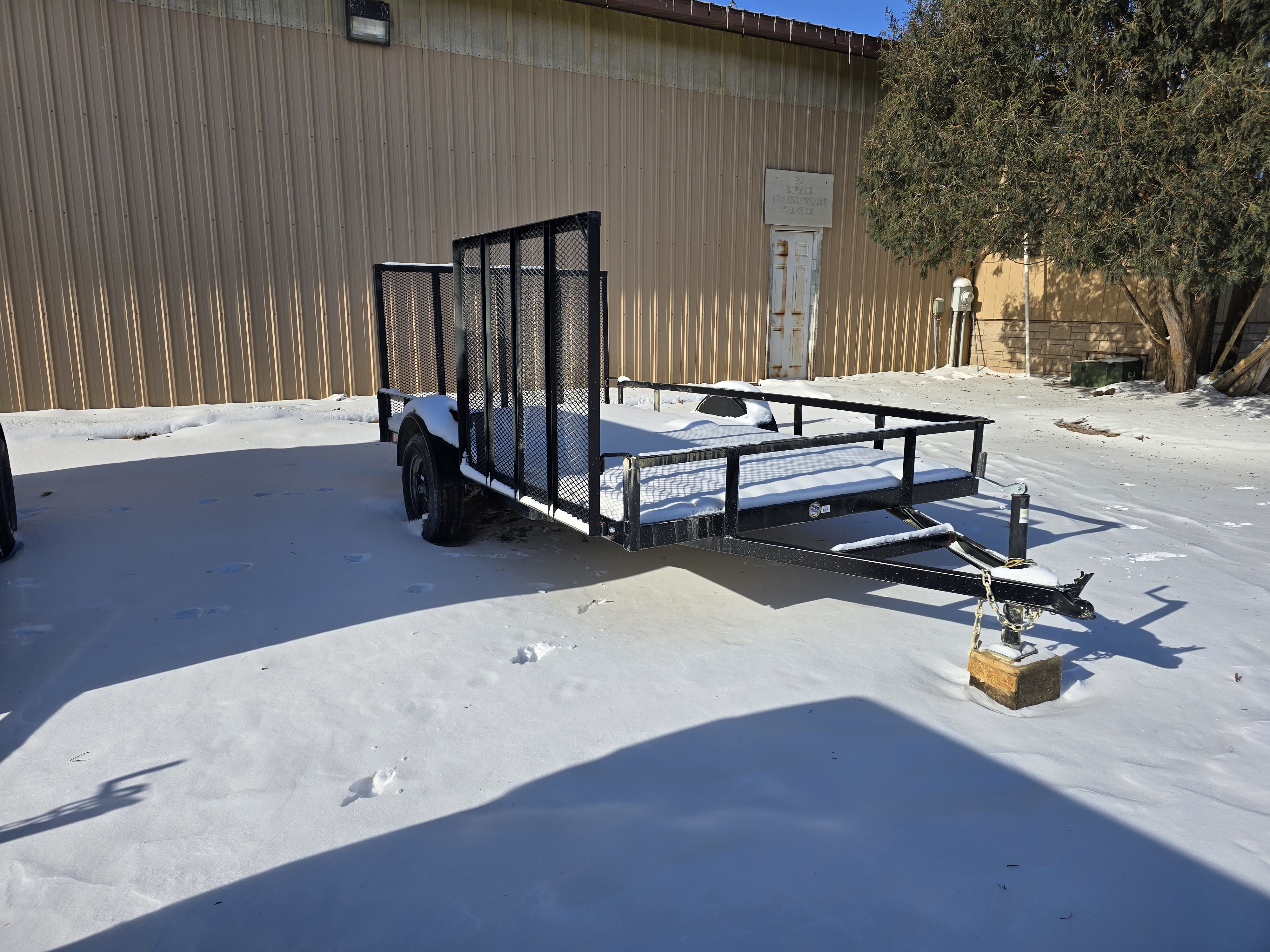 Teske 12ft black steel landscape and ATV trailer rental - reinforced side ramp for easy loading